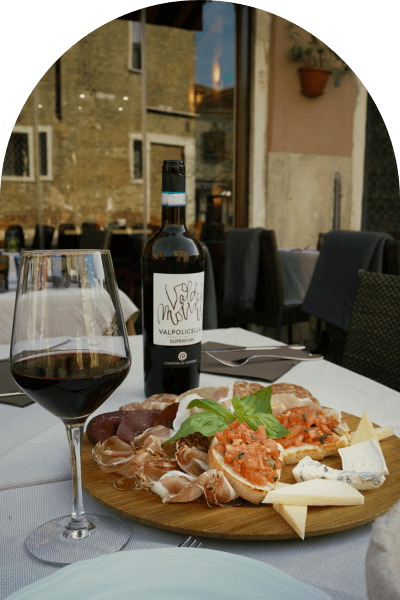 Wine pouring over a dinner table